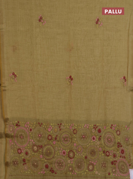 Linen saree green with embroidery buttas and embroidery pallu