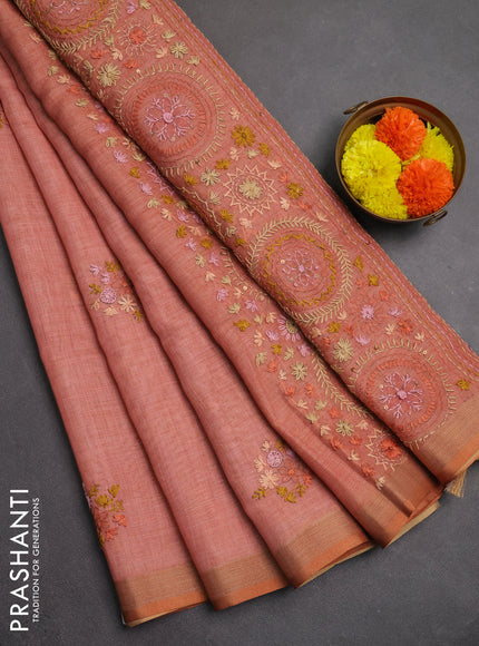 Linen saree peach shade with embroidery buttas and embroidery pallu