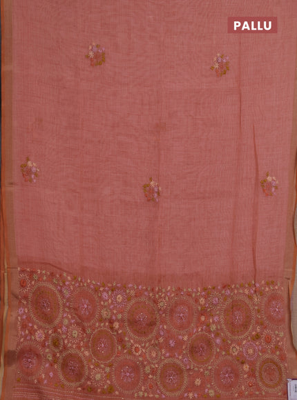 Linen saree peach shade with embroidery buttas and embroidery pallu