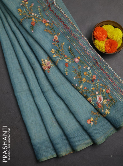 Linen saree pastel blue with embroidery buttas and embroidery pallu