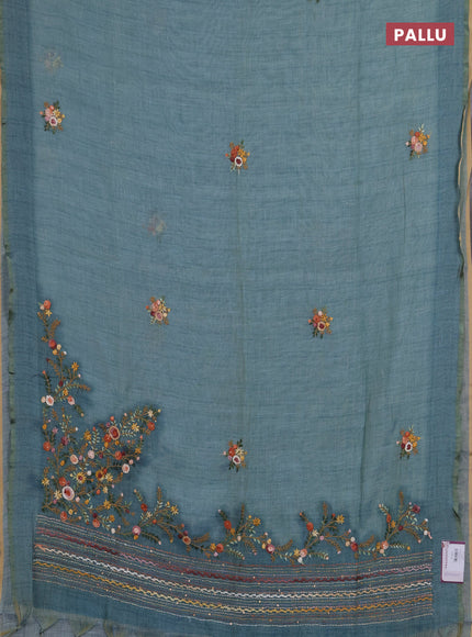 Linen saree pastel blue with embroidery buttas and embroidery pallu