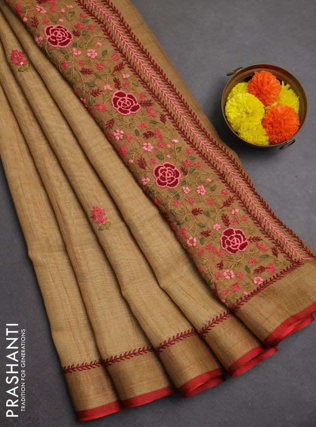 Linen saree dark mustard and maroon with embroidery buttas and embroidery pallu