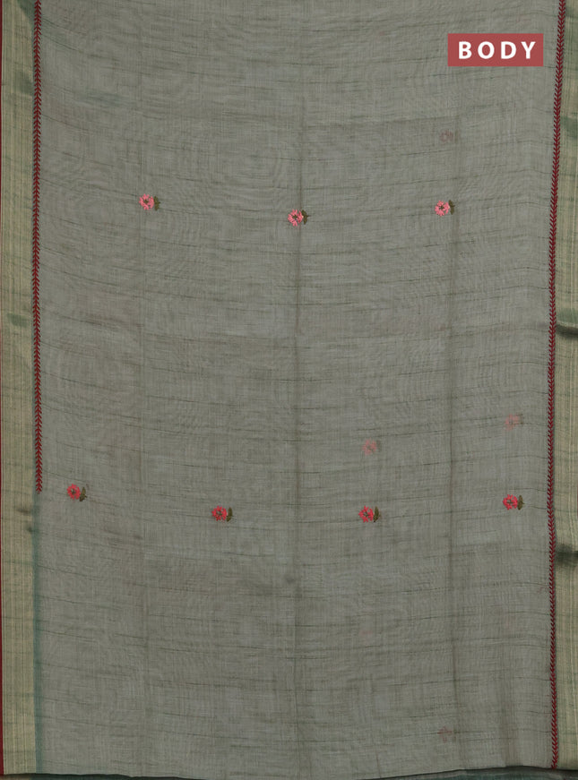 Linen saree pastel green and maroon with embroidery buttas and embroidery pallu