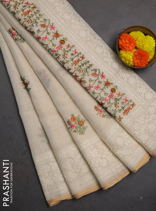 Linen saree beige with embroidery buttas and embroidery pallu