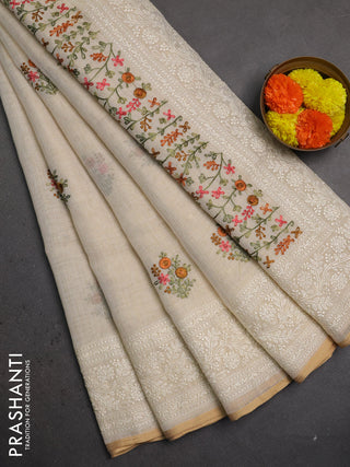 Linen saree beige with embroidery buttas and embroidery pallu