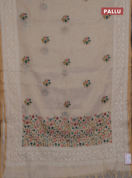 Linen saree beige and teal green with embroidery buttas and embroidery pallu