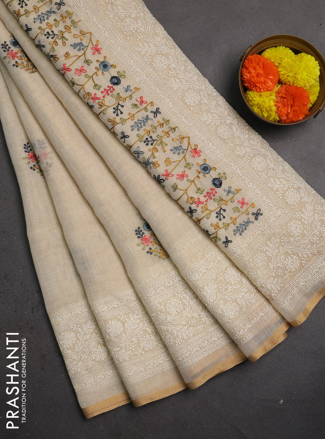 Linen saree beige and grey with embroidery buttas and embroidery pallu