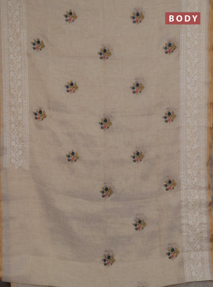 Linen saree beige and grey with embroidery buttas and embroidery pallu