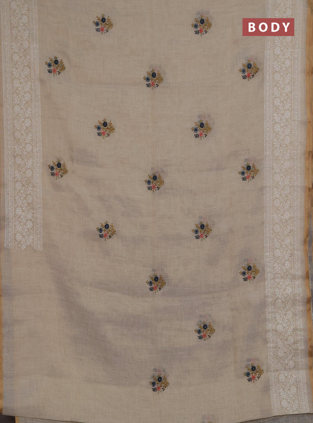 Linen saree beige and grey with embroidery buttas and embroidery pallu
