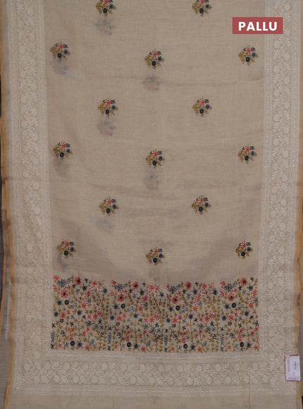 Linen saree beige and grey with embroidery buttas and embroidery pallu