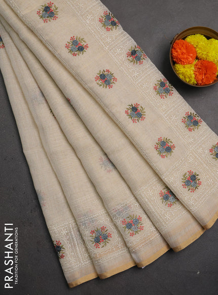 Linen saree beige and grey with embroidery buttas and embroidery pallu
