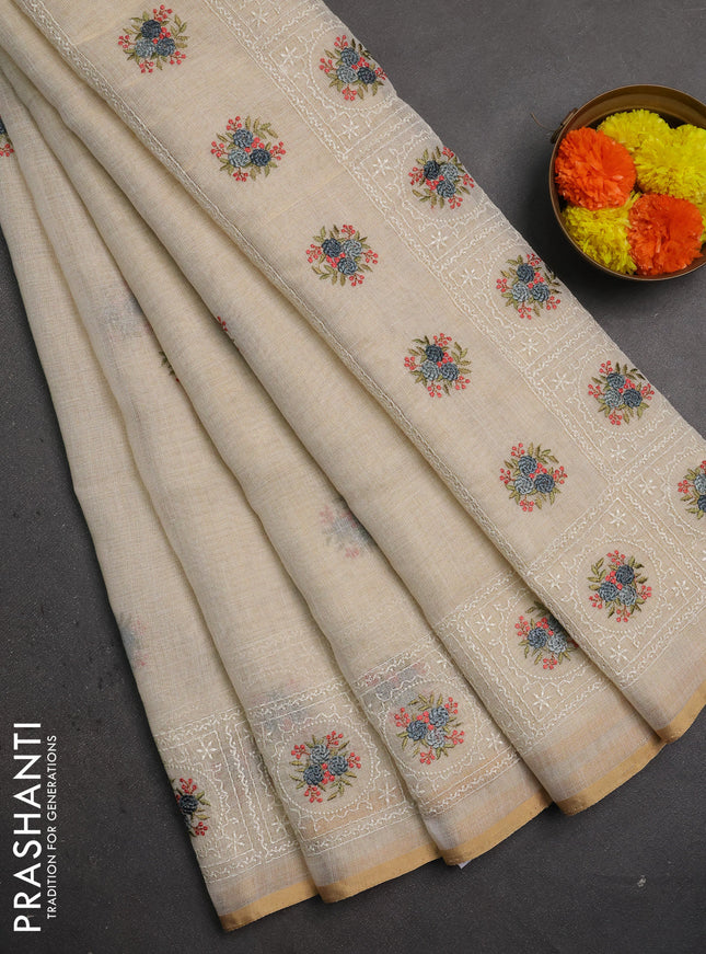 Linen saree beige and grey with embroidery buttas and embroidery pallu