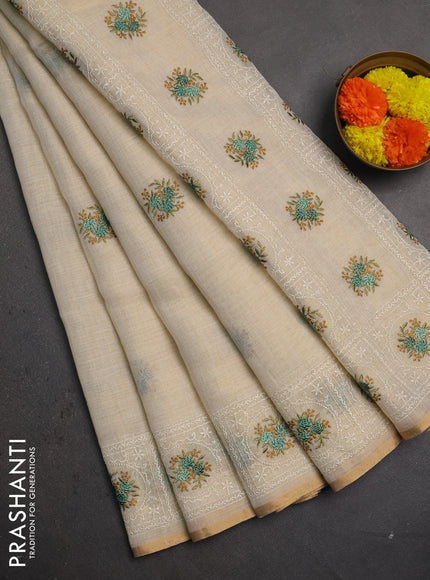 Linen saree beige and teal green with embroidery buttas and embroidery pallu