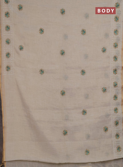 Linen saree beige and teal green with embroidery buttas and embroidery pallu