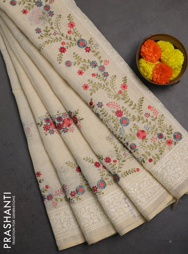 Linen saree beige and peach shade with embroidery buttas and embroidery pallu & border