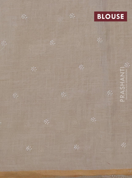 Linen saree beige and peach shade with embroidery buttas and embroidery pallu & border