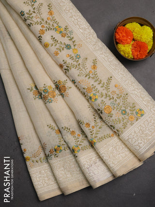 Linen saree beige and teal green with embroidery buttas and embroidery pallu & border