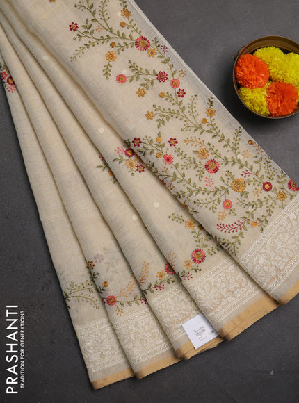 Linen saree beige and maroon with embroidery buttas and embroidery pallu & border