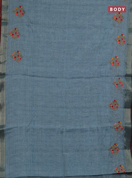Linen saree pastel blue and maroon with allover embroidery weaves and embroidery pallu & border