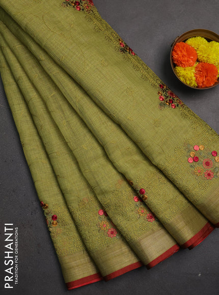 Linen saree light green and maroon with allover embroidery weaves and embroidery pallu & border