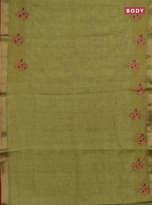 Linen saree light green and maroon with allover embroidery weaves and embroidery pallu & border