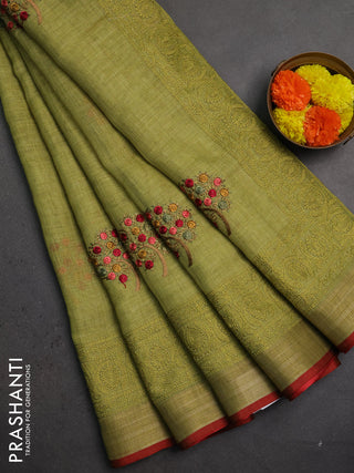 Linen saree light green and maroon with embroidery buttas and embroidery pallu & border