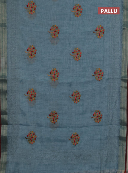 Linen saree pastel blue and maroon with embroidery buttas and embroidery pallu & border