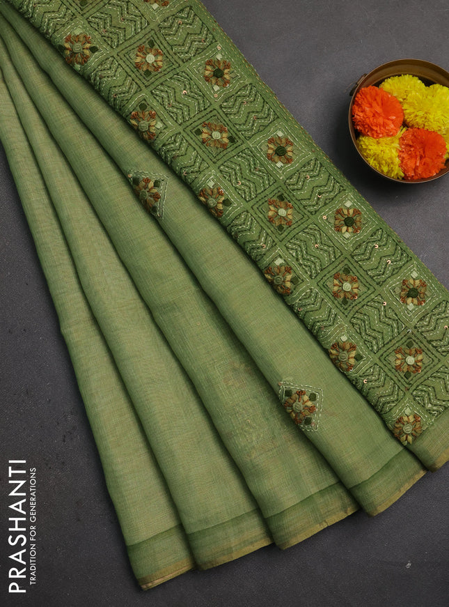 Linen saree light green with embroidery buttas and embroidery pallu