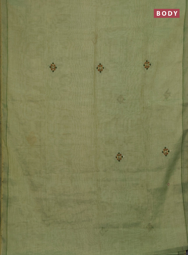 Linen saree light green with embroidery buttas and embroidery pallu
