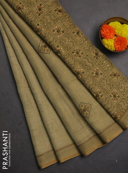 Linen saree mehendi green with embroidery buttas and embroidery pallu