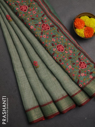 Linen saree pastel green and maroon with embroidery buttas and embroidery pallu
