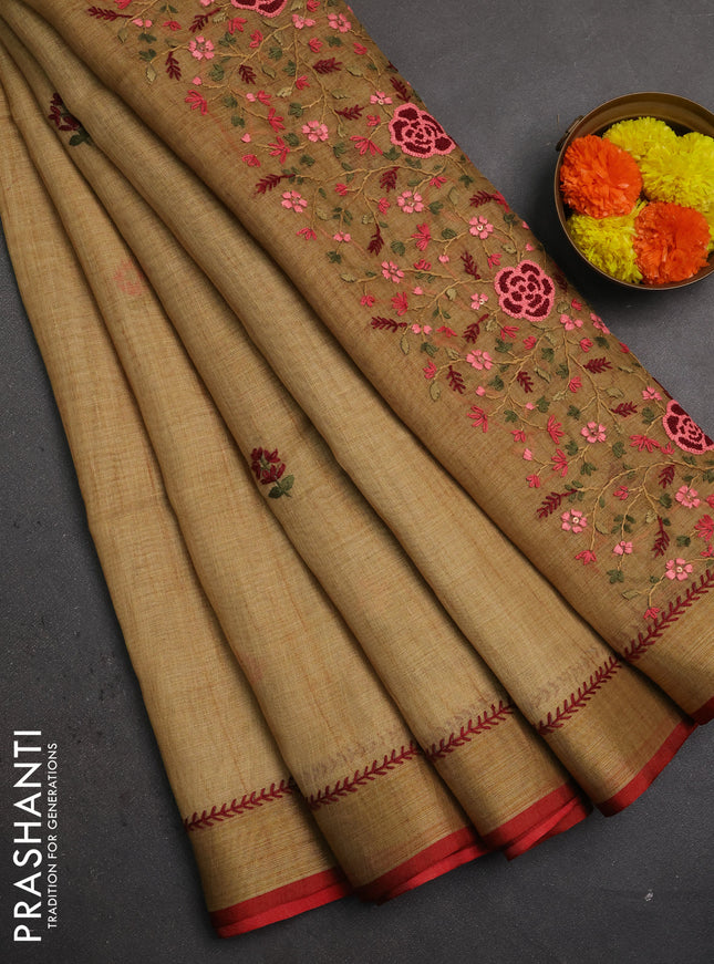 Linen saree dark mustard and maroon with embroidery buttas and embroidery pallu