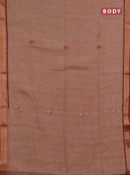 Linen saree dark peach and maroon with embroidery buttas and embroidery pallu