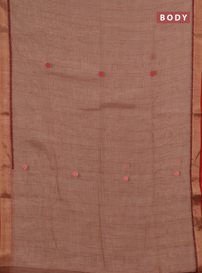 Linen saree dark peach and maroon with embroidery buttas and embroidery pallu