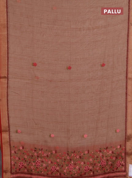 Linen saree dark peach and maroon with embroidery buttas and embroidery pallu