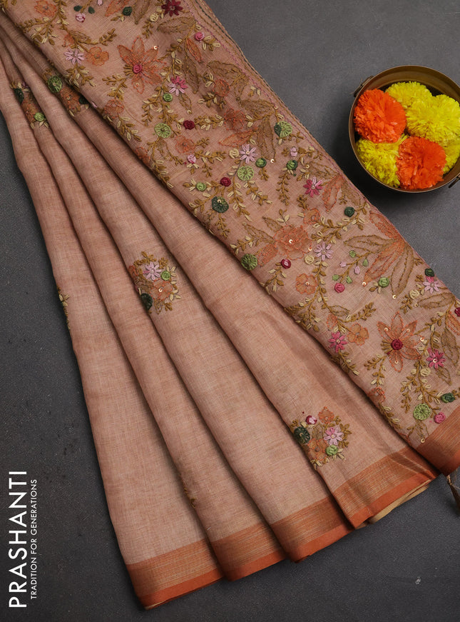 Linen saree mild peach and maroon with embroidery buttas and embroidery pallu