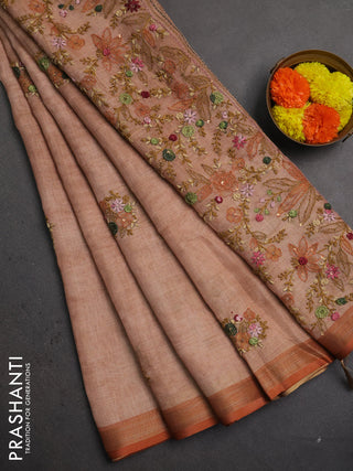 Linen saree mild peach and maroon with embroidery buttas and embroidery pallu