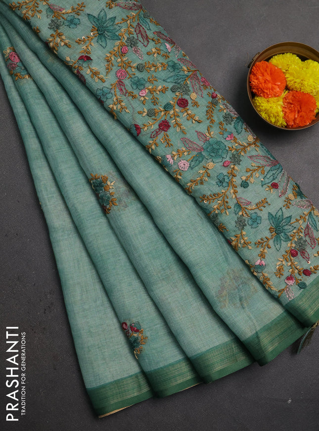 Linen saree teal green with embroidery buttas and embroidery pallu