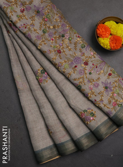 Linen saree mild grey and olive green with embroidery buttas and embroidery pallu