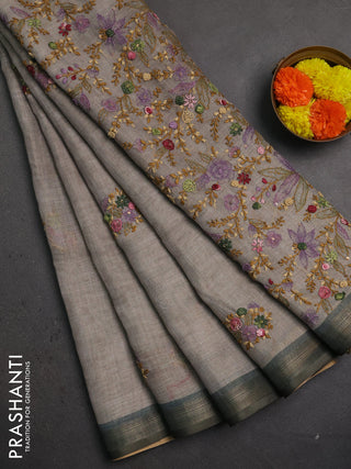 Linen saree mild grey and olive green with embroidery buttas and embroidery pallu
