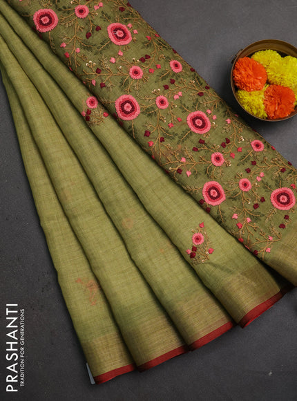 Linen saree light green and maroon with embroidery buttas and embroidery pallu