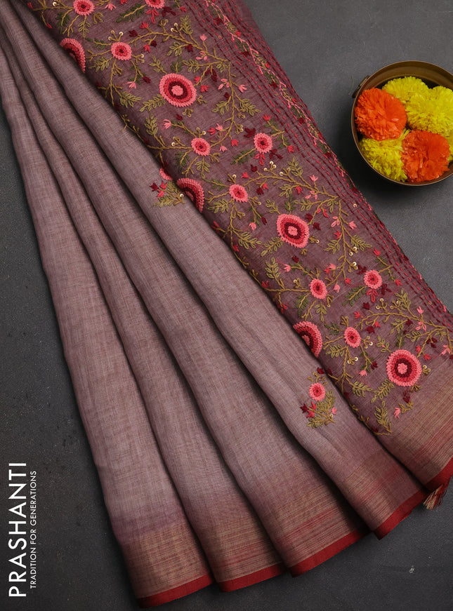 Linen saree pastel pink and maroon with embroidery buttas and embroidery pallu