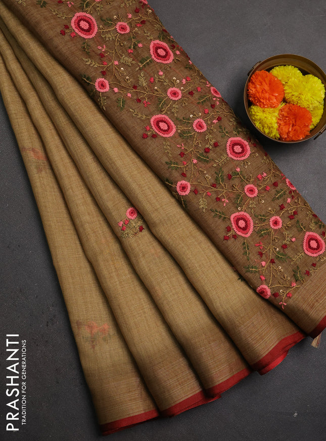 Linen saree dark mustard and maroon with embroidery buttas and embroidery pallu