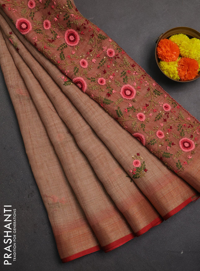Linen saree dark peach and maroon with embroidery buttas and embroidery pallu