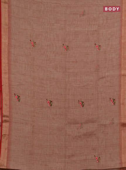 Linen saree dark peach and maroon with embroidery buttas and embroidery pallu