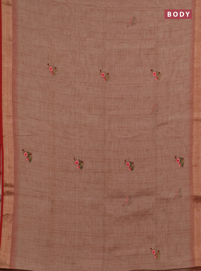 Linen saree dark peach and maroon with embroidery buttas and embroidery pallu