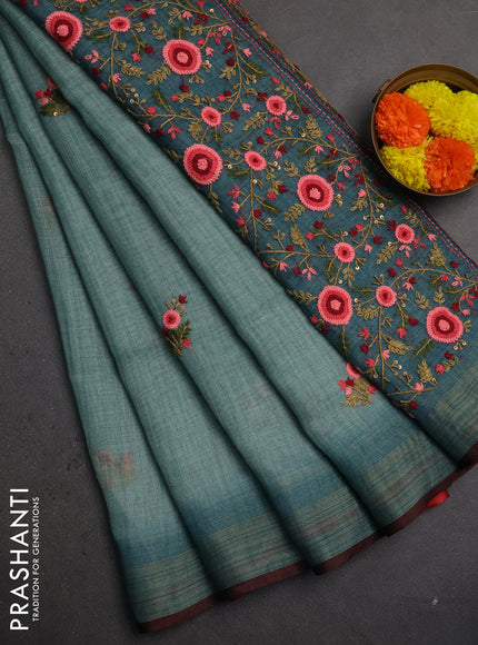 Linen saree pastel blue and maroon with embroidery buttas and embroidery pallu