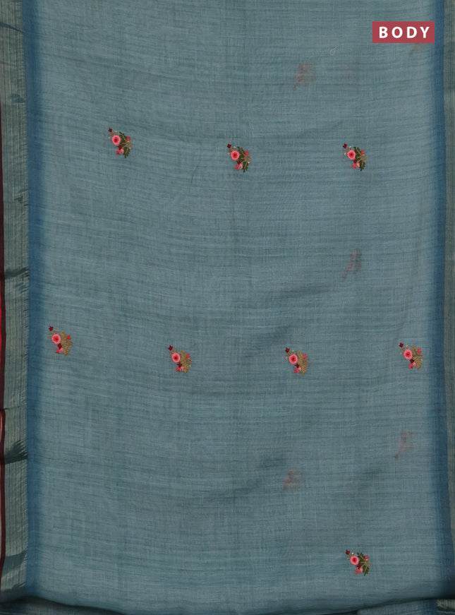 Linen saree pastel blue and maroon with embroidery buttas and embroidery pallu