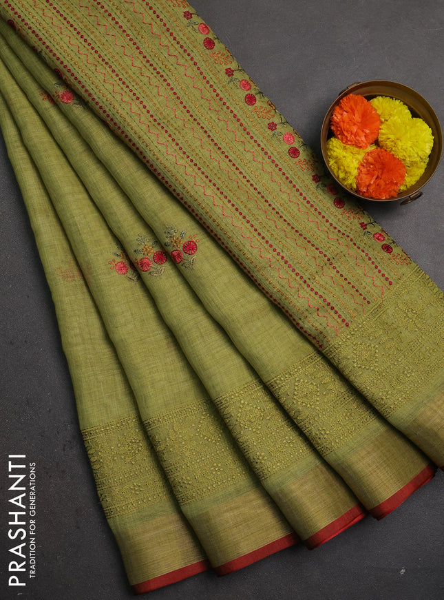 Linen saree light green and maroon with embroidery buttas and embroidery pallu & border