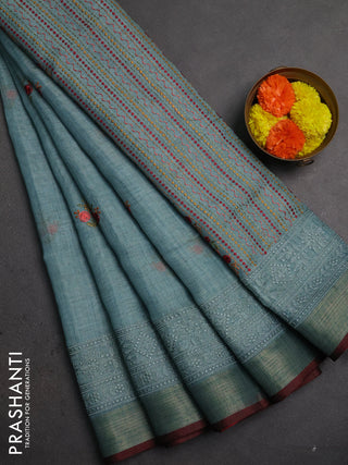 Linen saree pastel blue and maroon with embroidery buttas and embroidery pallu & border